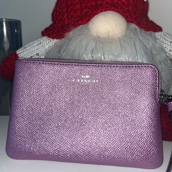 Coach Handbags - Coach Metallic Light Purple Wristlet